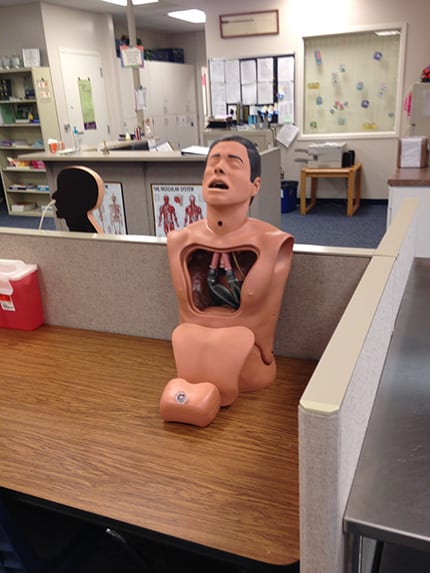 Simulation mannequin at a career open house at Lakeshore Tech
