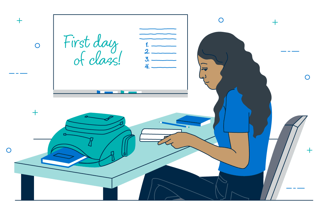 female-student-sitting-at-her-desk-reading-textbooks-on-the-first-day-of-class