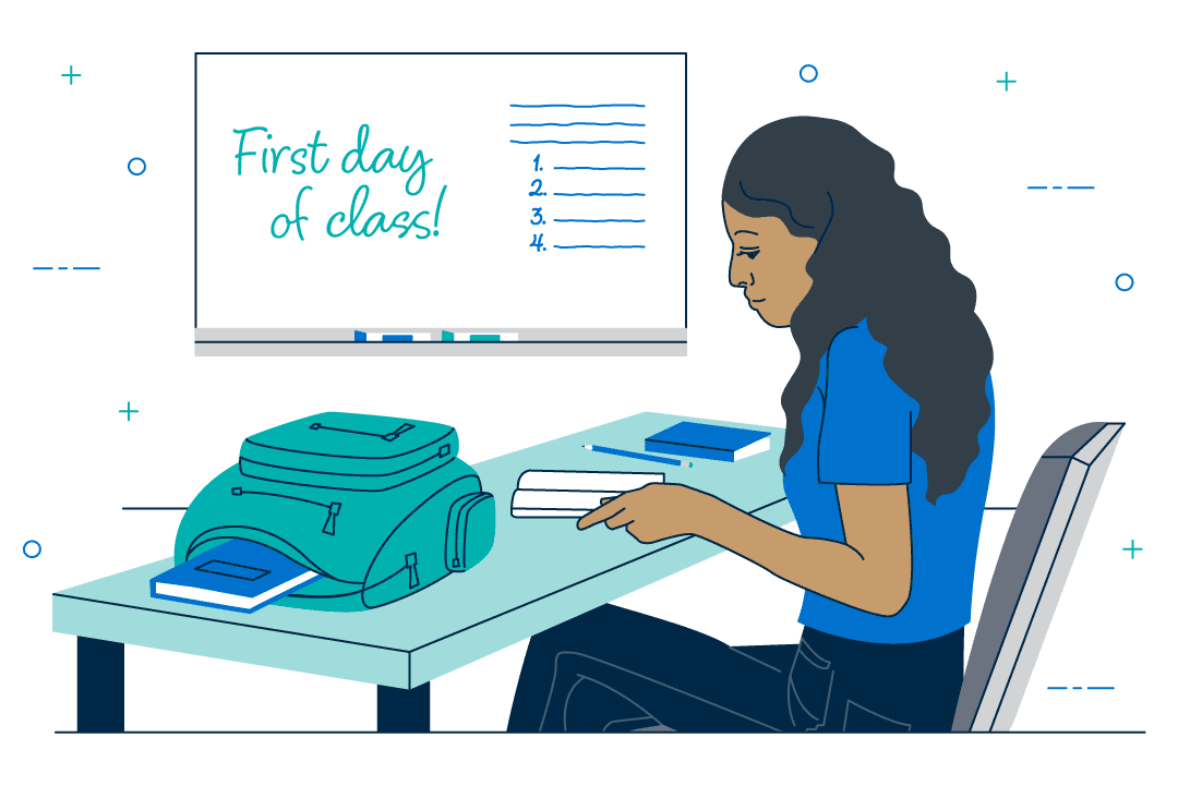 female-student-sitting-at-her-desk-reading-textbooks-on-the-first-day-of-class