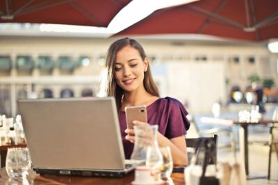 student-working-outdoors-on-laptop