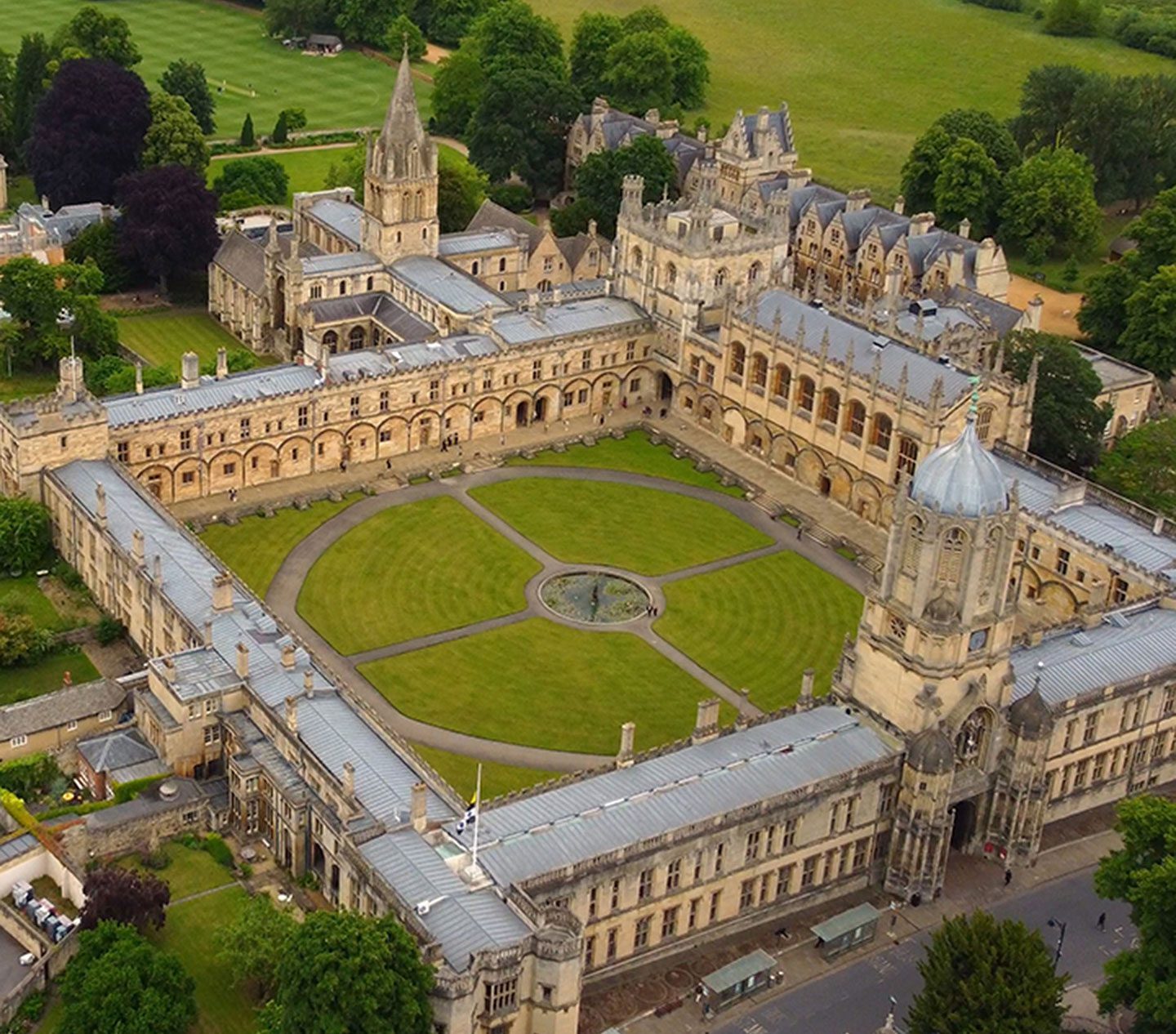 Arial-view-of-a-historic-university-campus-with-a-large-central-quadrangle-and-surrounding-gothic-buildings