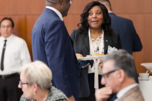 President chatting at 2025 Presidential Roundtable